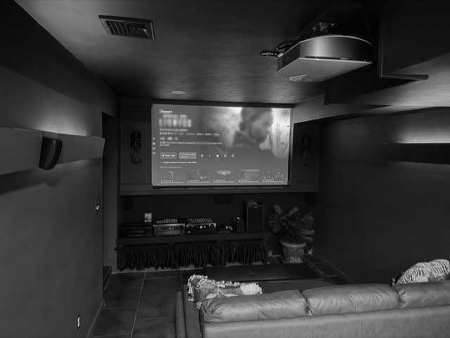 The 110-inch screen in David Schure's personal creative space